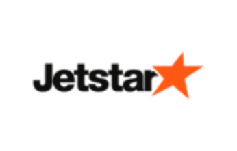 a jetstar logo with an orange star on a black background